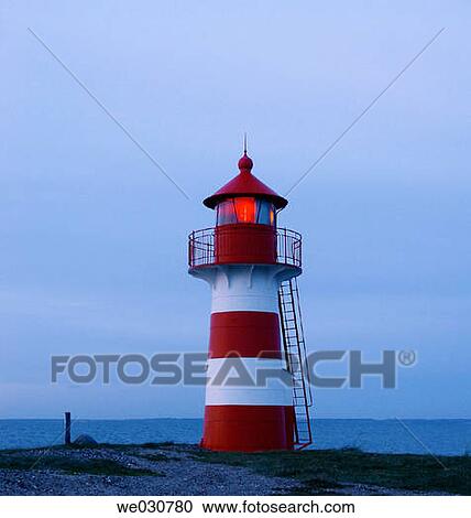 Lighthouse showing red light in the night. Oddesund, Denmark, Western Jutland View Large Photo Image Stock Image - Lighthouse showing red light in the night. Oddesund, Denmark, Western Jutland. Fotosearch
