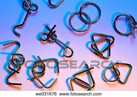 Stock Photograph - Metal Puzzles. Fotosearch
