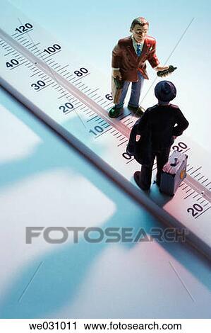Miniature businessmen and thermometer View Large Photo Image Stock Image - Miniature businessmen and thermometer. Fotosearch