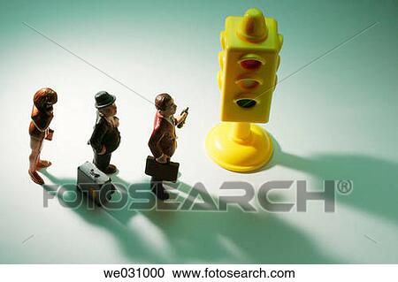 Miniature pedestrians at traffic light View Large Photo Image Stock Image - Miniature pedestrians at traffic light. Fotosearch