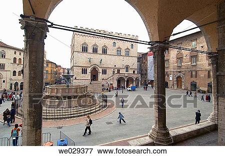 Palazzo dei Priori (aka Palazzo Comunale, town hall) and Fontana Maggiore in Piazza Quattro Novembre. Perugia. Umbria, Italy View Large Photo Image Stock Photo - Palazzo dei Priori (aka Palazzo Comunale, town hall) and Fontana Maggiore in Piazza Quattro Novembre. Perugia. Umbria, Italy. Fotosearch