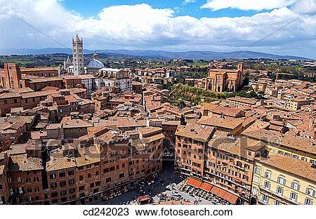 Piazza del Campo with duomo on the left and church of San Domenico on the right. Siena. Tuscany, Italy View Large Photo Image Stock Image - Piazza del Campo with duomo on the left and church of San Domenico on the right. Siena. Tuscany, Italy. Fotosearch