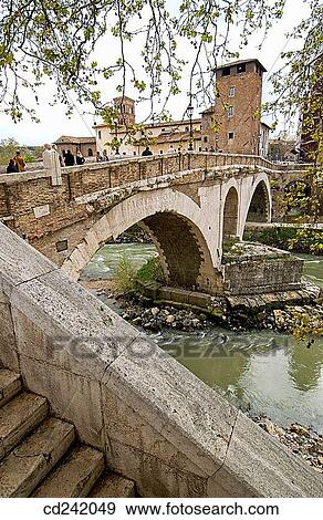 Ponte Fabricio or Quattro Capi (bridge of the four heads). Isola Tiberina. Rome. Italy View Large Photo Image Stock Photo - Ponte Fabricio or Quattro Capi (bridge of the four heads). Isola Tiberina. Rome. Italy. Fotosearch
