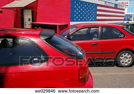 Red cars, cars in parking lot near beauty shop with American flag motif. Vancouver, Washington. USA View Large Photo Image Stock Photograph - Red cars, cars in parking lot near beauty shop with American flag motif. Vancouver, Washington. USA. Fotosearch