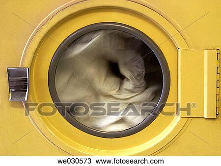 Spinning laundry in the washing machine View Large Photo Image Stock Image - Spinning laundry in the washing machine. Fotosearch