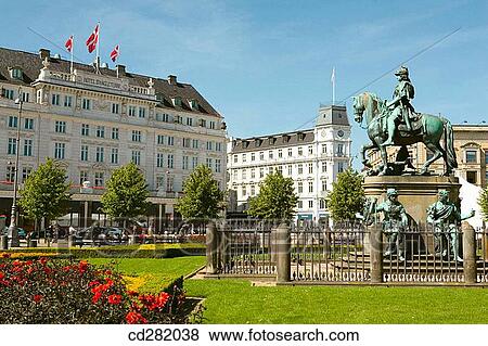 Stock Photo - Statue of King Christian V, known as The Horse, Copenhagen, Denmark Kongens Nytorv. The Kings New Square.. Fotosearch