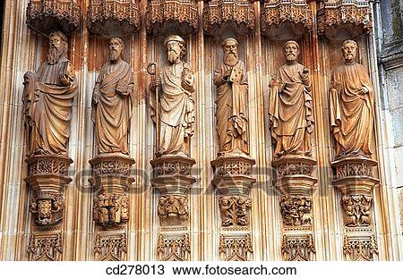 Stock Image - Statues on archivolts, main fa? ade of the Monastery of Santa Maria da Vit? ria (aka Monastery of Batalha), Leiria. Portugal. Fotosearch