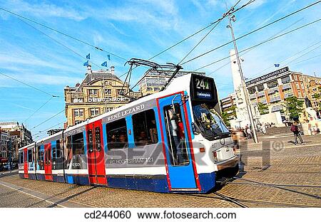 Tram and National Monument on Dam Square. Amsterdam. Netherlands View Large Photo Image Stock Image - Tram and National Monument on Dam Square. Amsterdam. Netherlands. Fotosearch