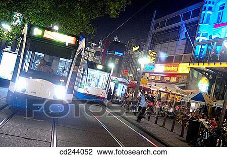 Trams at Rembrandtplein. Amsterdam. Netherlands View Large Photo Image Stock Image - Trams at Rembrandtplein. Amsterdam. Netherlands. Fotosearch