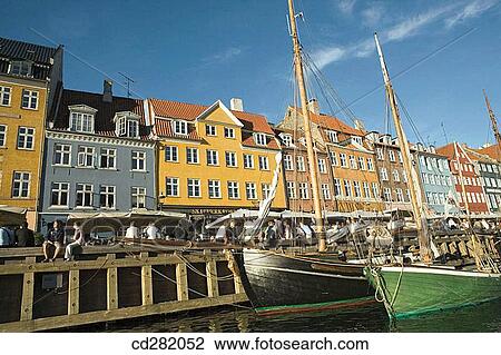 Typical architecture and boats at Nyhavn canal, Copenhagen, Denmark View Large Photo Image Stock Image - Typical architecture and boats at Nyhavn canal, Copenhagen, Denmark. Fotosearch