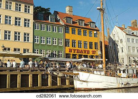 Typical architecture and boats at Nyhavn canal, Copenhagen, Denmark View Large Photo Image Stock Image - Typical architecture and boats at Nyhavn canal, Copenhagen, Denmark. Fotosearch