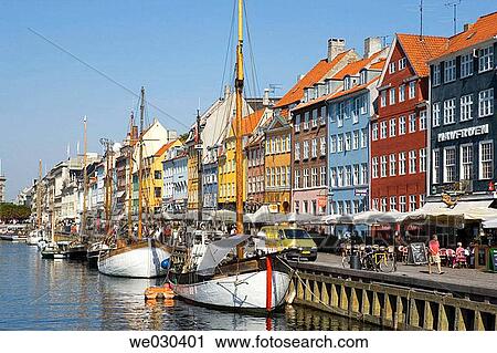 Stock Image - Typical architecture and boats at Nyhavn canal, Copenhagen, Denmark. Fotosearch