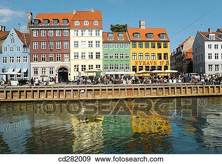 Typical architecture and boats at Nyhavn canal, Copenhagen, Denmark View Large Photo Image Stock Photo - Typical architecture and boats at Nyhavn canal, Copenhagen, Denmark. Fotosearch