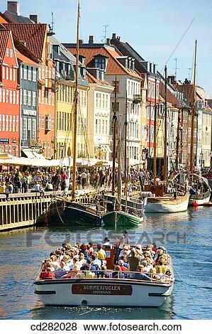 Typical architecture and boats at Nyhavn canal, Copenhagen, Denmark View Large Photo Image Stock Photo - Typical architecture and boats at Nyhavn canal, Copenhagen, Denmark. Fotosearch