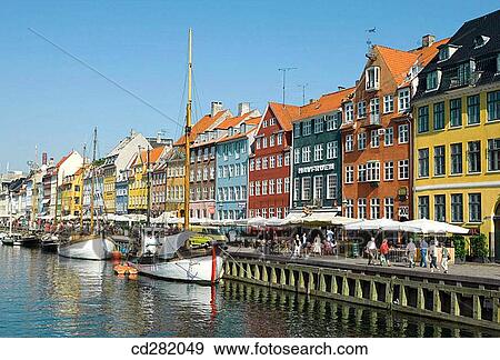 Typical architecture and boats at Nyhavn canal, Copenhagen, Denmark View Large Photo Image Stock Photo - Typical architecture and boats at Nyhavn canal, Copenhagen, Denmark. Fotosearch