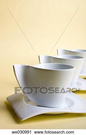 White coffee cups made of china ware in a row View Large Photo Image Stock Image - White coffee cups made of china ware in a row. Fotosearch
