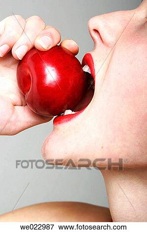 Woman Eating Apple View Large Photo Image Stock Photo - Woman Eating Apple. Fotosearch