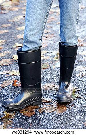 Woman in tall rubber boots View Large Photo Image Picture - Woman in tall rubber boots. Fotosearch