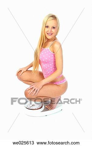 Woman on Scale View Large Photo Image Stock Image - Woman on Scale. Fotosearch