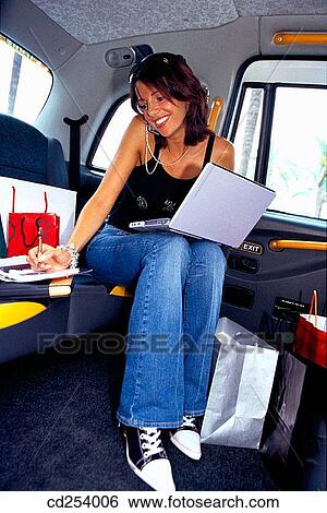 Woman working in London Taxi View Large Photo Image Stock Photograph - Woman working in London Taxi. Fotosearch