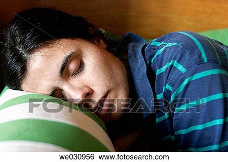 Young woman sleeping View Large Photo Image Stock Photograph - Young woman sleeping. Fotosearch