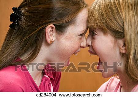 10 and 11 year old siblings, anger View Large Photo Image Picture - 10 and 11 year old siblings, anger. Fotosearch