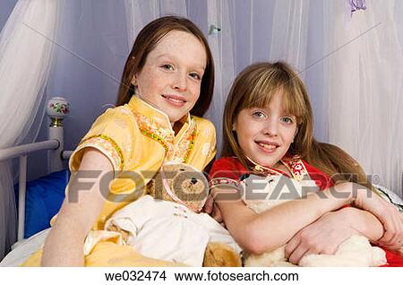 10 and 11 year old siblings bedtime View Large Photo Image Picture - 10 and 11 year old siblings bedtime. Fotosearch