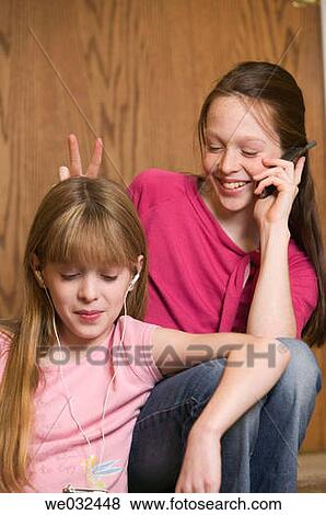 Stock Photo - 10 and 11 year old siblings. Fotosearch