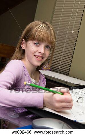 10 year old Caucasian girl doing homework View Large Photo Image Stock Photograph - 10 year old Caucasian girl doing homework. Fotosearch