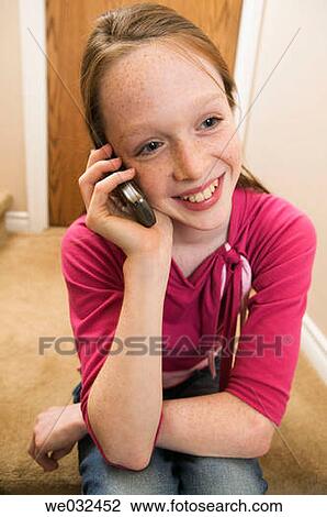 11 year old Caucasian girl talking on cellphone View Large Photo Image Stock Image - 11 year old Caucasian girl talking on cellphone. Fotosearch