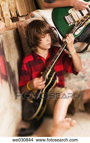 Picture - 13 and 15 year old Caucasian brothers. Fotosearch