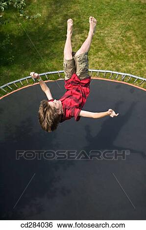 13 year old Caucasian male on trampoline View Large Photo Image Stock Photograph - 13 year old Caucasian male on trampoline. Fotosearch