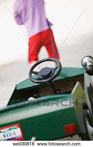 2 1/2 Caucasian girl with peddle car View Large Photo Image Stock Photo - 2 1/2 Caucasian girl with peddle car. Fotosearch
