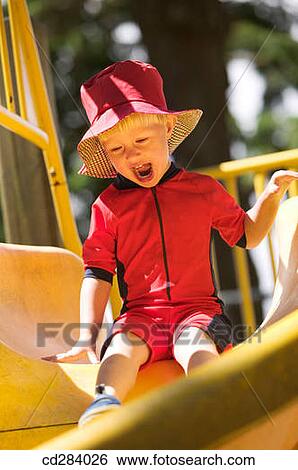 2. 5 yeard Caucasian girl on play ground slide View Large Photo Image Stock Photograph - 2. 5 yeard Caucasian girl on play ground slide. Fotosearch