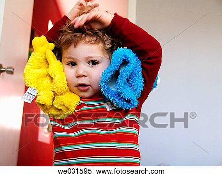 2-year-old boy with stuffed animals View Large Photo Image Stock Photography - 2-year-old boy with stuffed animals. Fotosearch