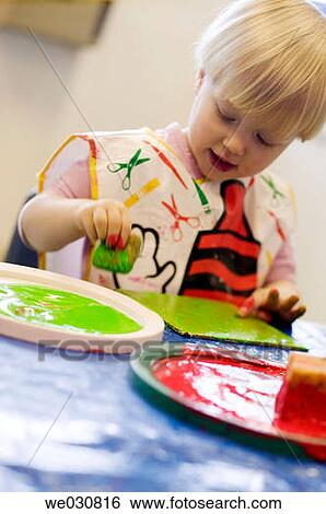 2 year old Caucasian girl at a craft class View Large Photo Image Stock Photograph - 2 year old Caucasian girl at a craft class. Fotosearch