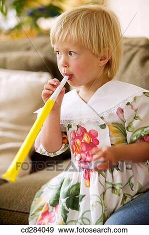 3 year old Caucasian girl at birthday party View Large Photo Image Stock Photo - 3 year old Caucasian girl at birthday party. Fotosearch