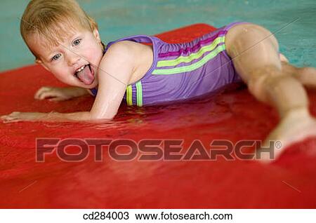 3 year old Caucasian girl swimming View Large Photo Image Stock Image - 3 year old Caucasian girl swimming. Fotosearch