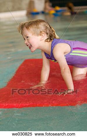 3 year old Caucasian girl swimming View Large Photo Image Stock Photography - 3 year old Caucasian girl swimming. Fotosearch