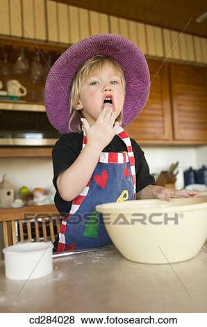 3 year old girl mixing cookie dough View Large Photo Image Stock Photo - 3 year old girl mixing cookie dough. Fotosearch