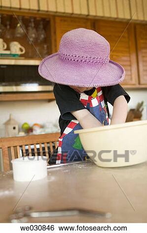 3 year old girl mixing cookie dough View Large Photo Image Stock Photograph - 3 year old girl mixing cookie dough. Fotosearch