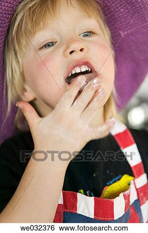 3 year old tasting cookie dough View Large Photo Image Stock Photograph - 3 year old tasting cookie dough. Fotosearch