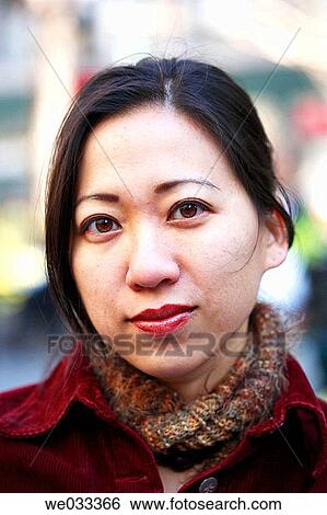 30's Asian woman looking in camera View Large Photo Image Stock Photograph - 30's Asian woman looking in camera. Fotosearch