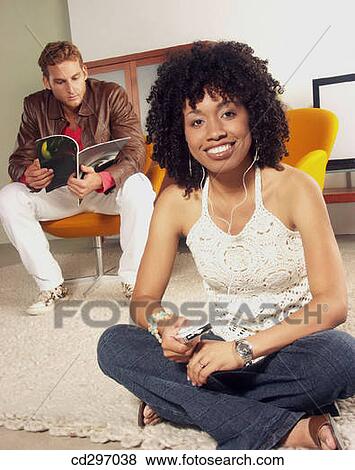 Stock Photo - 30's, contemporary, at-home, 20's. Fotosearch