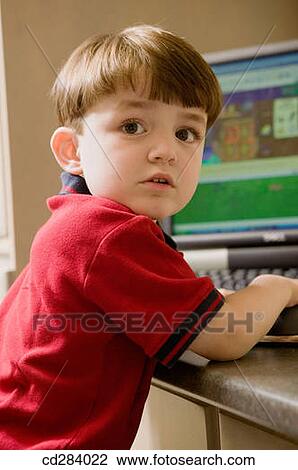 Stock Image - 4 year old boy (mixed ethnic Iranian/Caucasian). Fotosearch