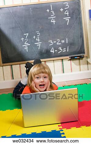 4 year old Caucasian girl and laptop View Large Photo Image Picture - 4 year old Caucasian girl and laptop. Fotosearch
