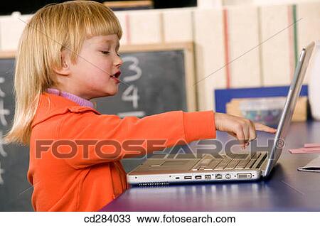 4 year old Caucasian girl and laptop View Large Photo Image Stock Image - 4 year old Caucasian girl and laptop. Fotosearch