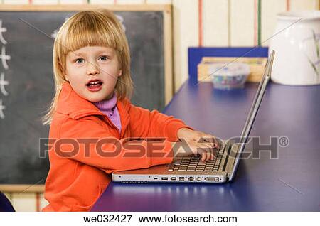4 year old Caucasian girl and laptop View Large Photo Image Stock Photo - 4 year old Caucasian girl and laptop. Fotosearch
