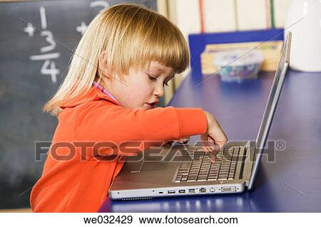 4 year old Caucasian girl and laptop View Large Photo Image Stock Photo - 4 year old Caucasian girl and laptop. Fotosearch