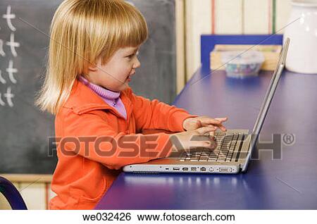 4 year old Caucasian girl and laptop View Large Photo Image Stock Photograph - 4 year old Caucasian girl and laptop. Fotosearch